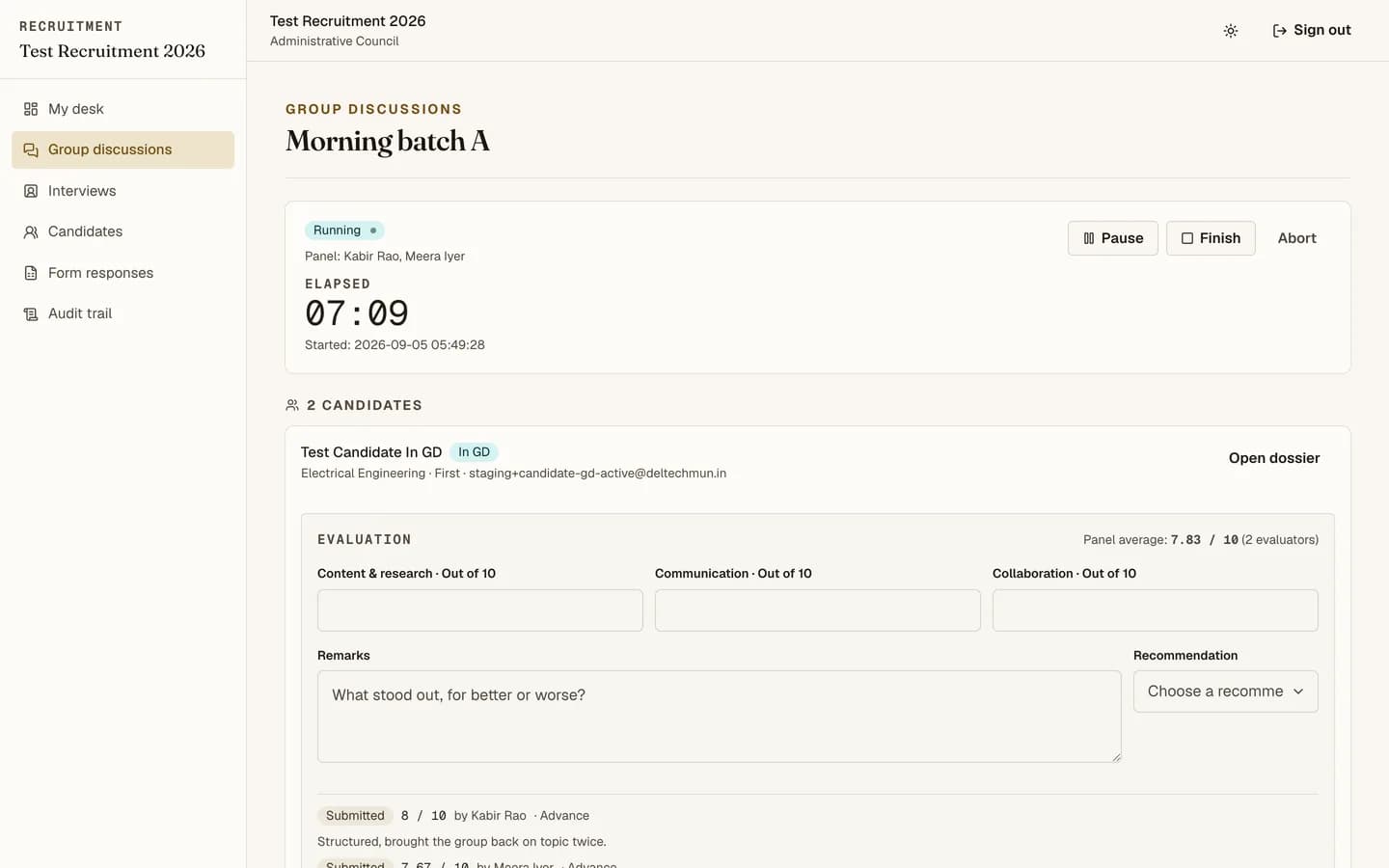 A live group discussion console with a running timer and evaluation forms
